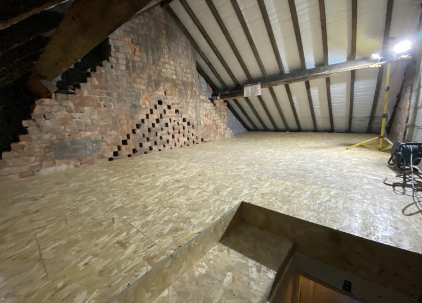Loft conversion with new boarded floor and steel purlins
